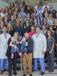 Twins, their parents, and the team at CHOP