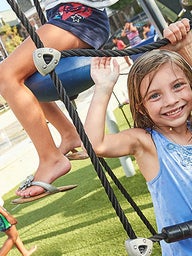 Girl playing on playground