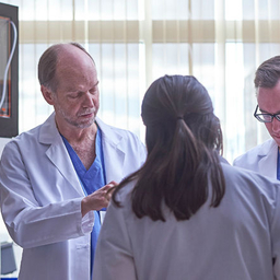 Fetal doctors talking in lab