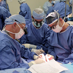 Surgeons Performing Hand Transplant Surgery