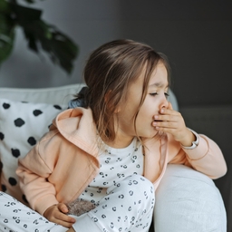 girl coughing pertussis. 