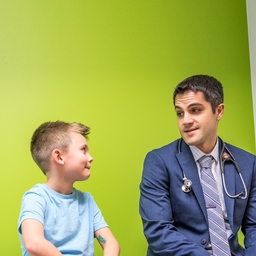 Physician speaking with patient