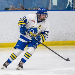 Morgan playing ice hockey