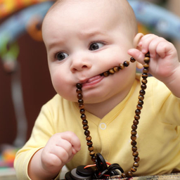 baby with beads