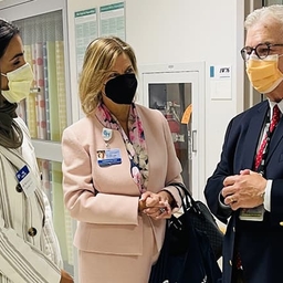 Three people talking with mask on