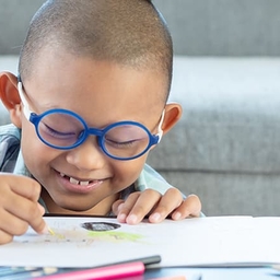 Young boy drawing a picture