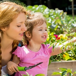 Mother and daughter in the garden