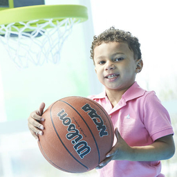 Young boy holding a basketball