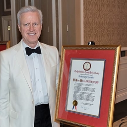 Dr. Adzick with his award