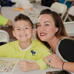 Mother and son smiling