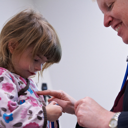 Primary Care visit - young girl with doctor