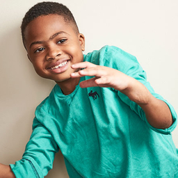 Zion holding a football