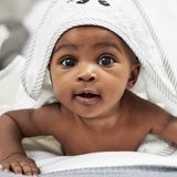 Baby with hooded towel