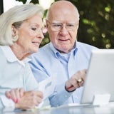 Older couple looking at paperwork 