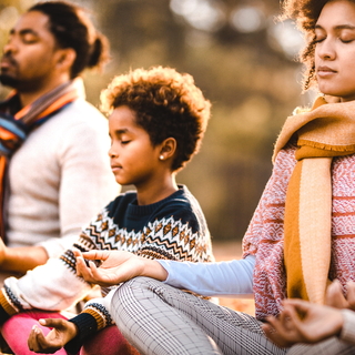 Family doing yoga